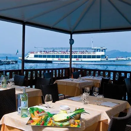Отель Del Porto 4*
